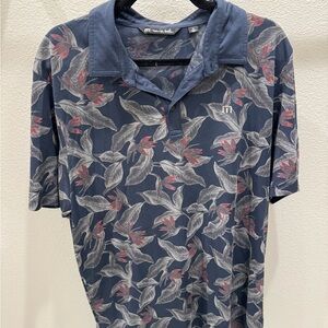 Travis Matthew Men's Blue Floral Polo Shirt